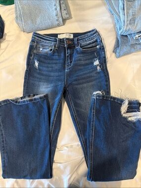 High-Rise Distressed Women's Jeans in Dark Blue